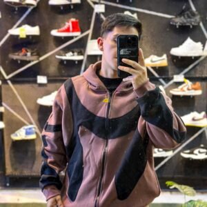 Campera frizada bicolor marron y negro